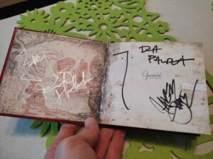 Płyta Illusion z autografami